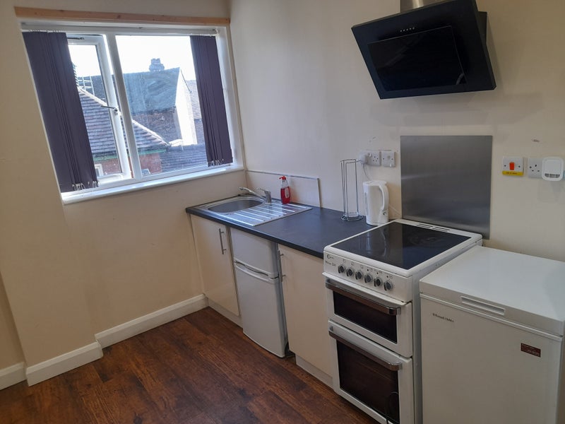 Photo 1: Kitchen Area