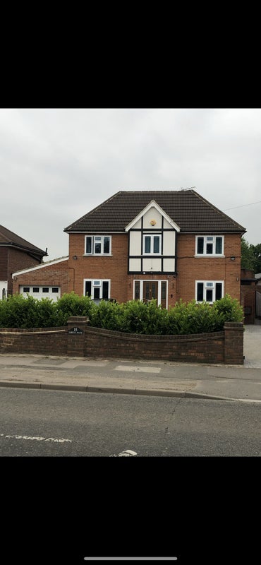 Photo 1: Front of house