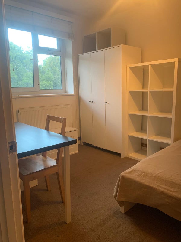 Photo 1: Double bedroom, furnished with wardrobe, draws and desk