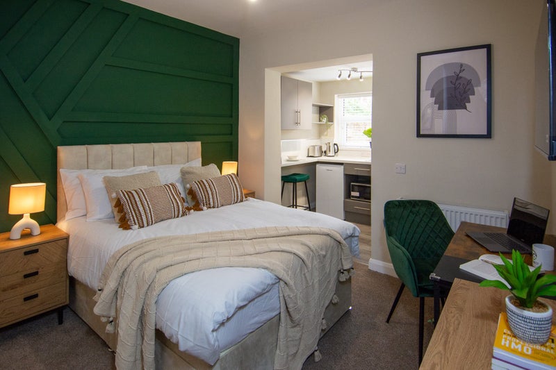 Photo 1: ROOM 2 - ensuite, kitchenette, desk, TV, ethernet socket