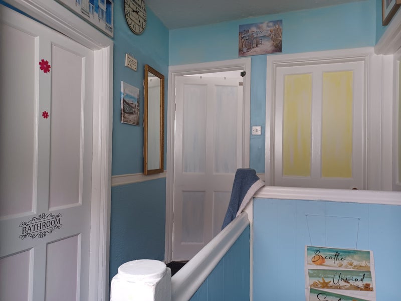 Photo 1: Blue Door is the spare room