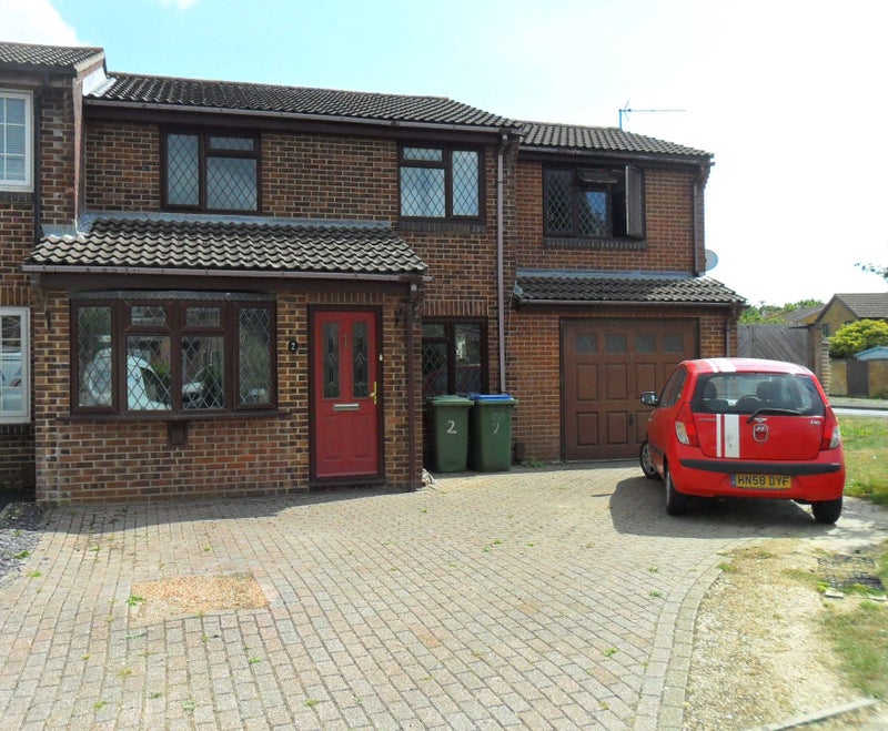 Photo 1: House and sports car (not).