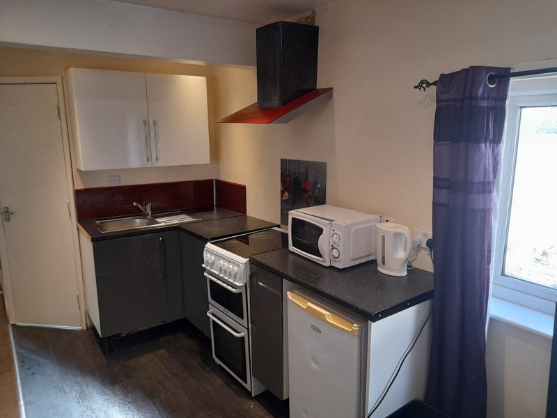 Photo 1: Kitchen Area