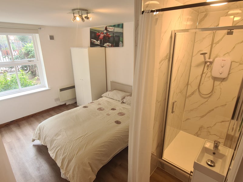 Photo 1: Bedroom 2 with private bathroom (11 sq-m)
