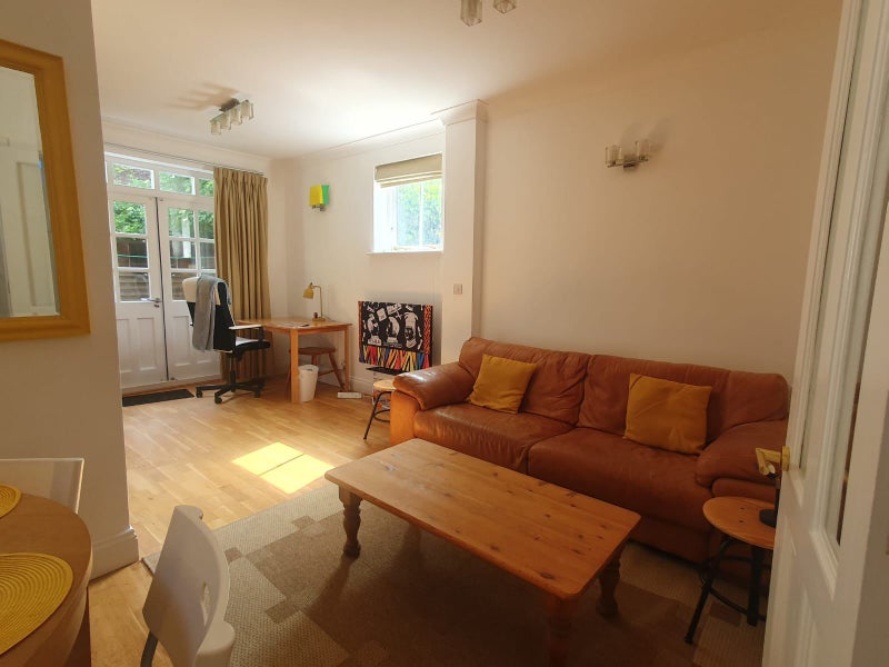 Photo 1: The living room (downstairs)