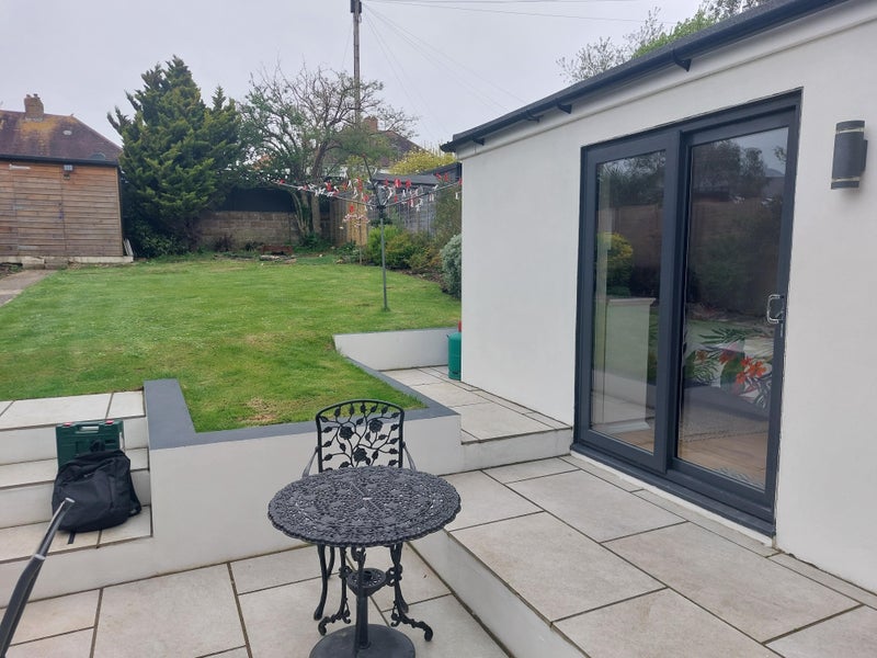 Photo 1: Private entrance, shared patio and garden