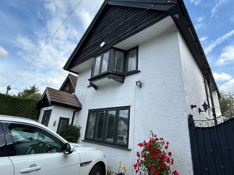 Photo 1: front of house