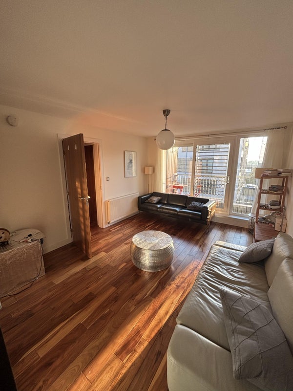 Photo 1: Shared living room