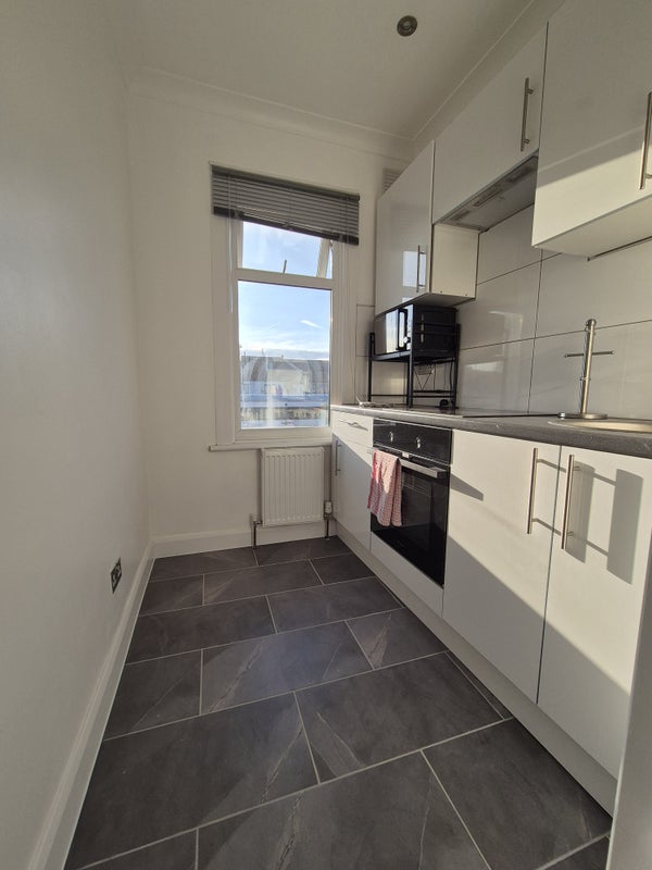 Photo 1: Kitchen
