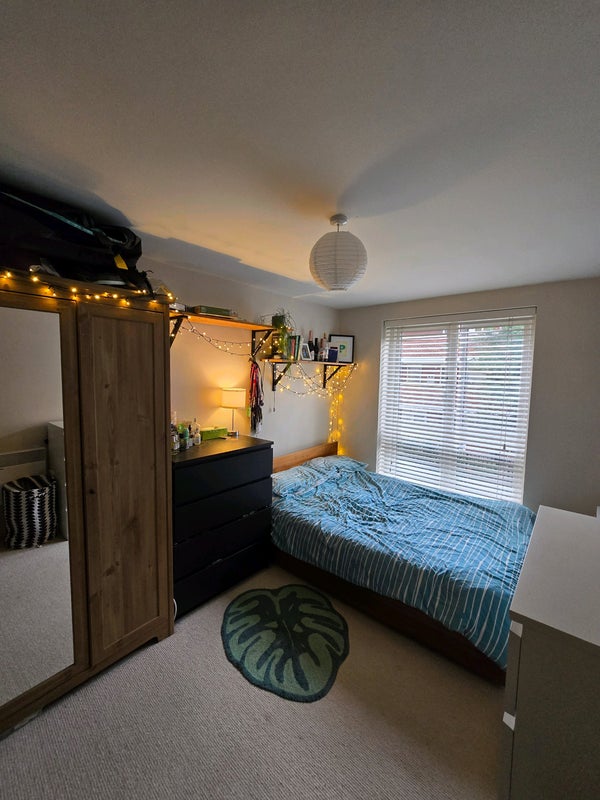 Photo 1: Bedroom - Double bed, wardrobe, chest of drawers, shelves