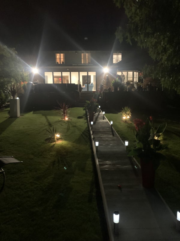 Photo 1: Back garden at night