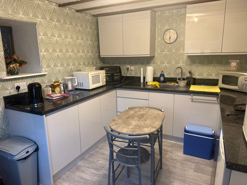 Photo 1: One of the two kitchens in the house