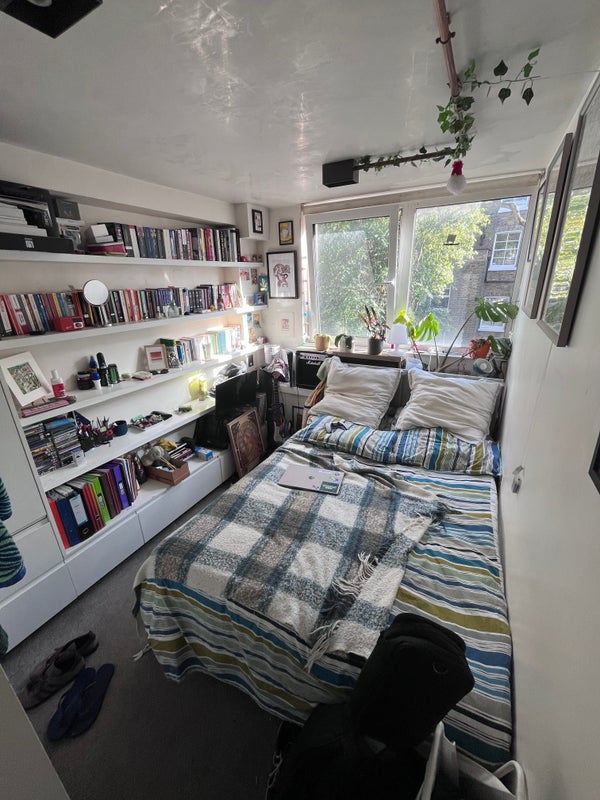Photo 1: Bedroom with view of window