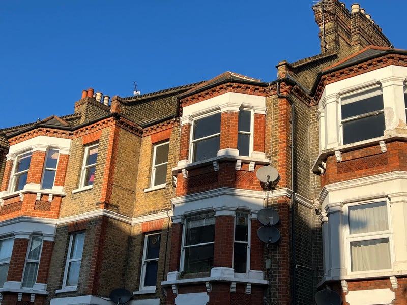 Photo 1: Top two floors of period building
