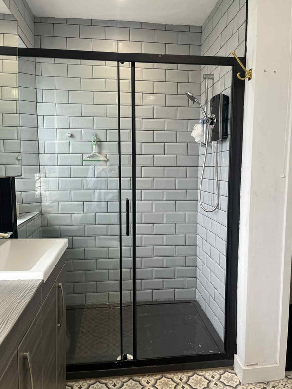 Photo 1: Shared bathroom double shower