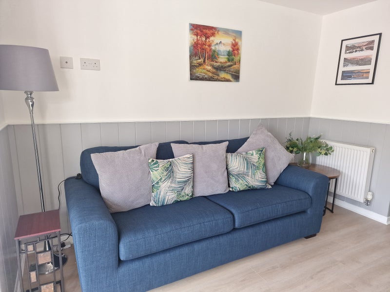 Photo 1: Shared open plan living area