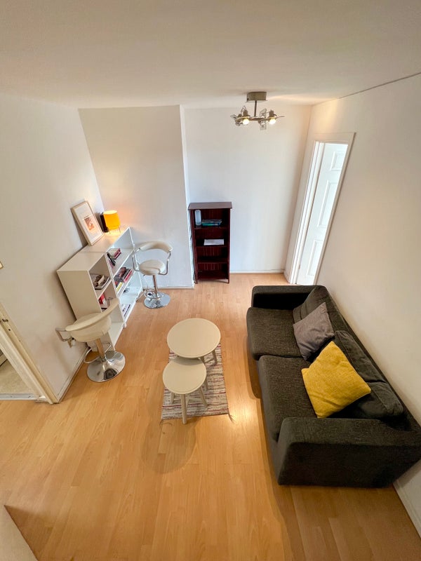 Photo 1: Spacious living room shared with 2 other young people