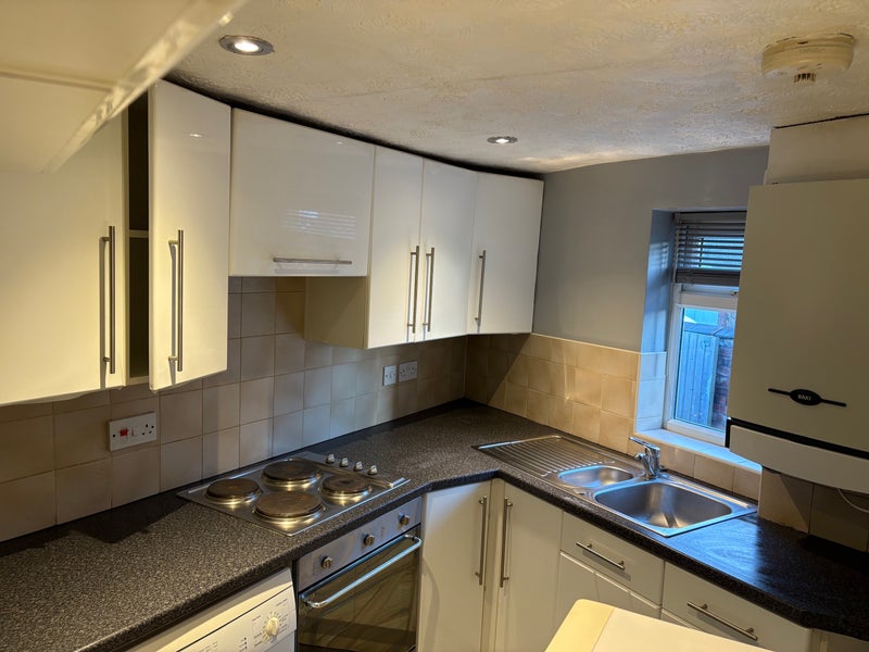 Photo 1: Kitchen