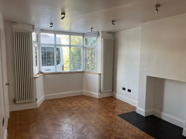 Photo 1: Grd floor bedroom window