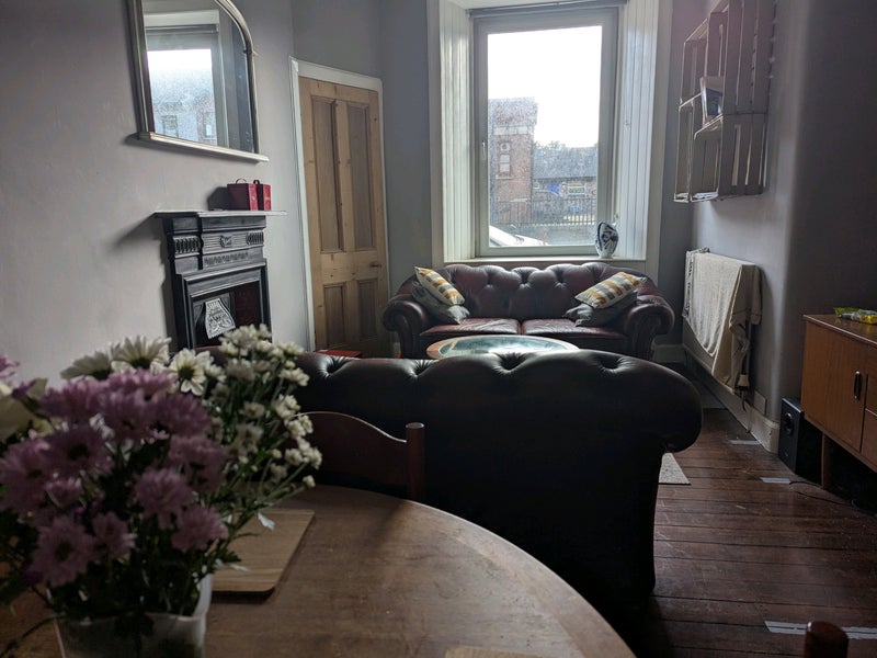 Photo 1: Living/dining room