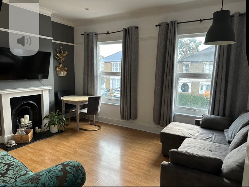 Photo 1: Shared living room