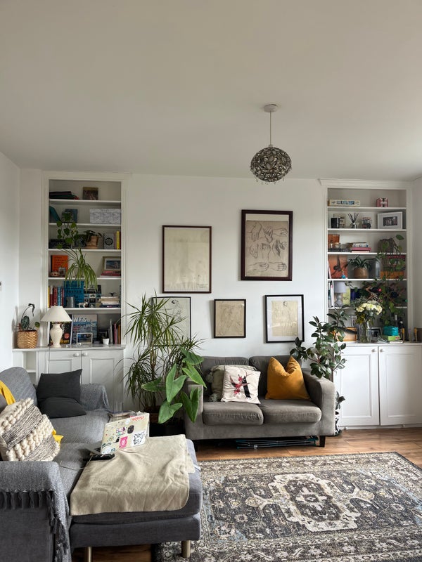 Photo 1: Own lovely and artsy living room