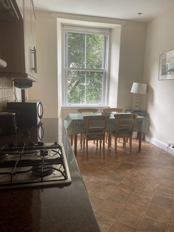Photo 1: Kitchen dining area