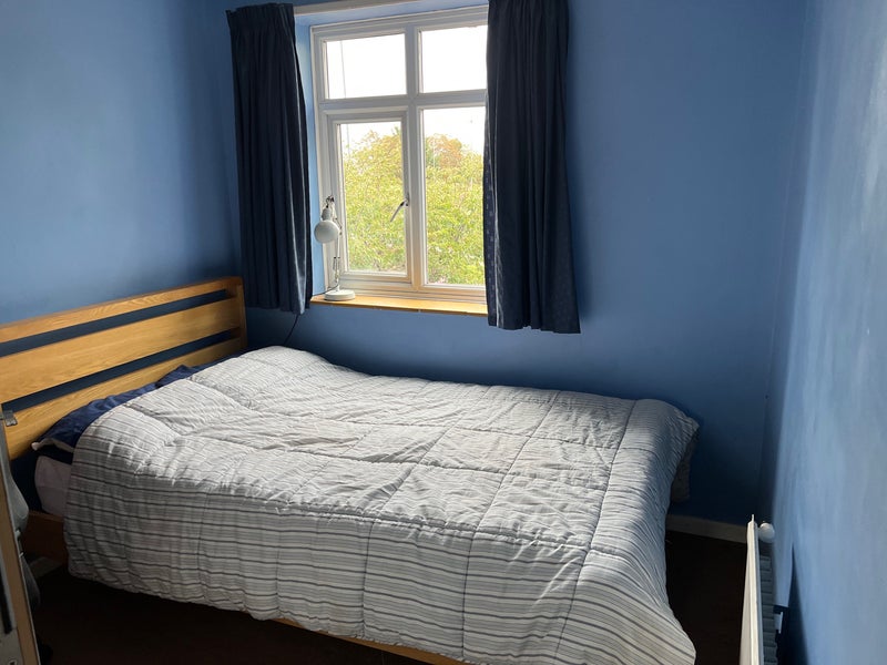Photo 1: Small double bed. There will be a new mattress