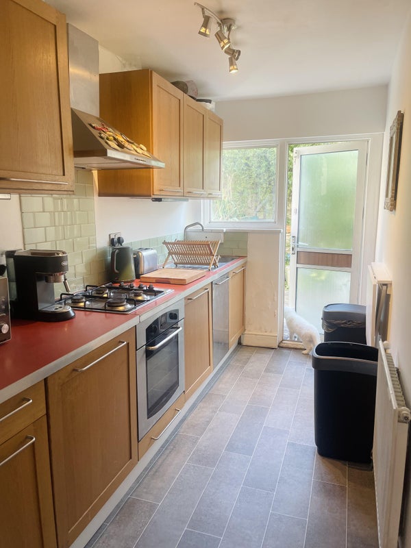 Photo 1: kitchen leading into garden