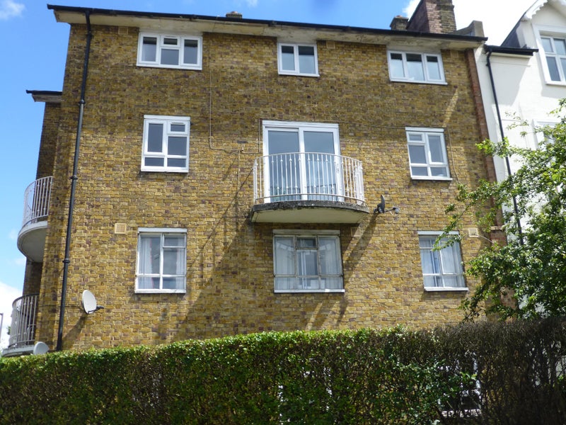 Photo 1: Exterior of the building