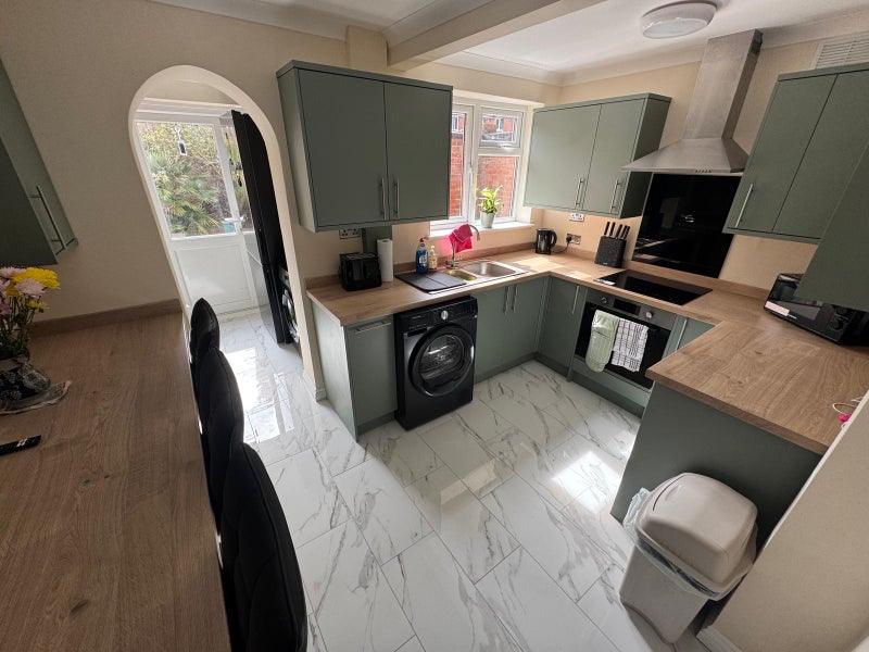 Photo 1: Kitchen