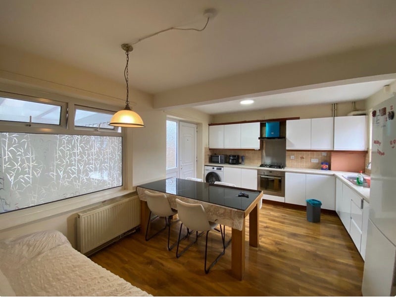 Photo 1: Shared Living/Dining Area