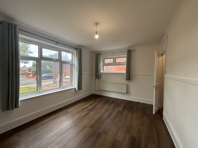 Photo 1: Spacious living room with brand new flooring