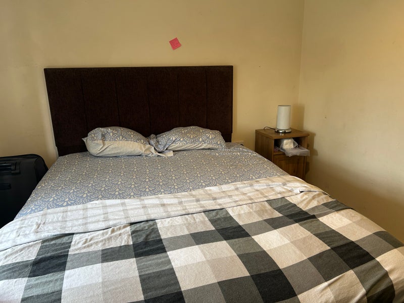 Photo 1: Bedroom showing bed with mattress