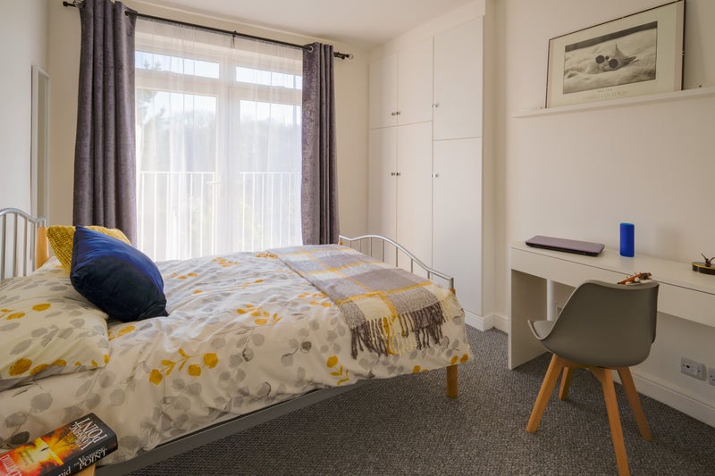 Photo 1: Room5 with its own French windows opening onto a private balcony