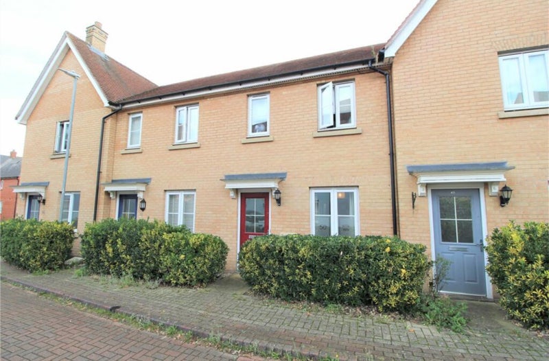 Photo 1: Front of house, red door