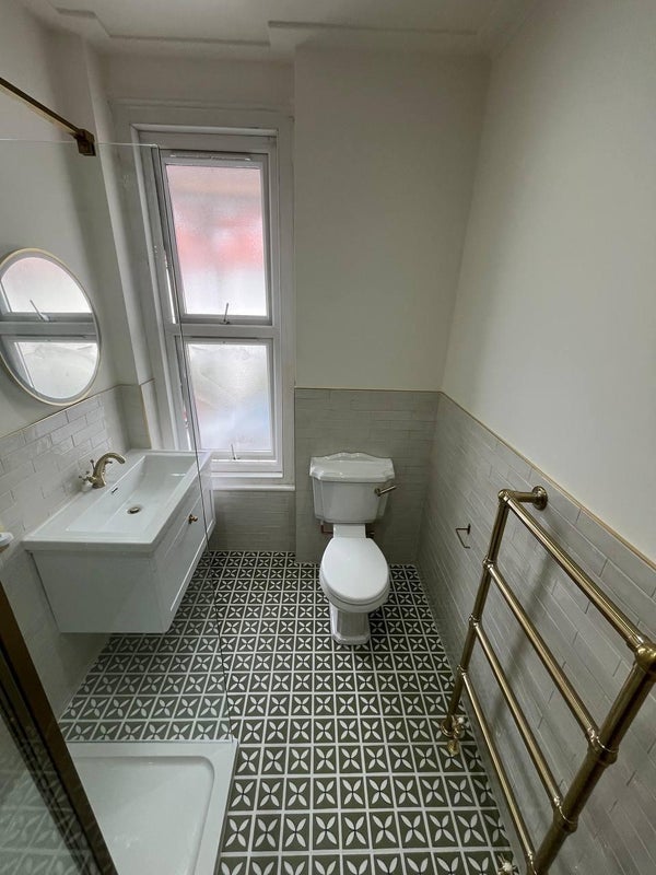 Photo 1: New shower room.