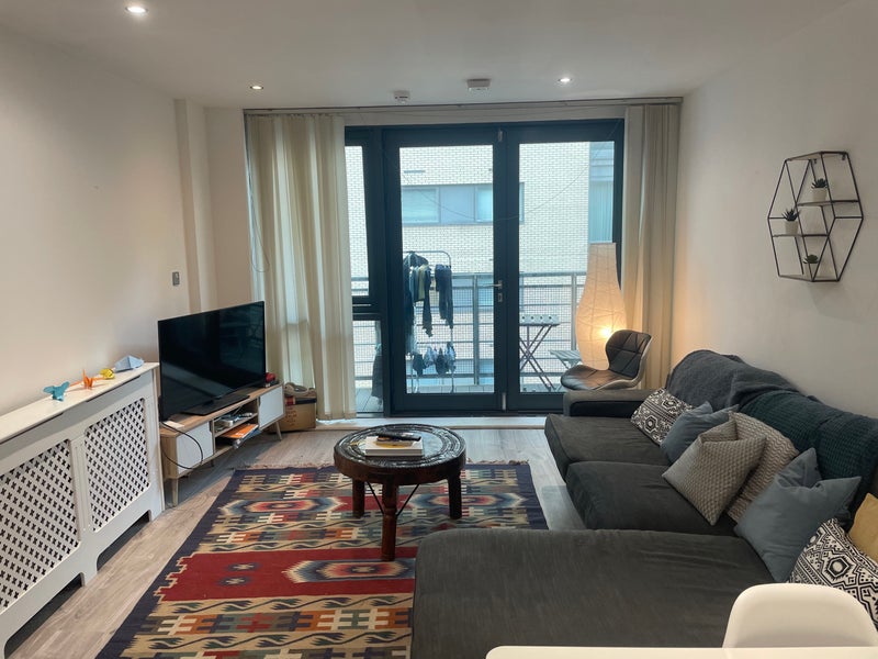 Photo 1: Living room + balcony