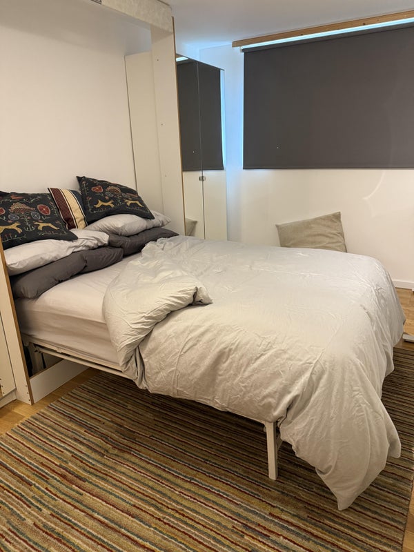 Photo 1: Comfortable solid wallbed with comfortable firm mattress