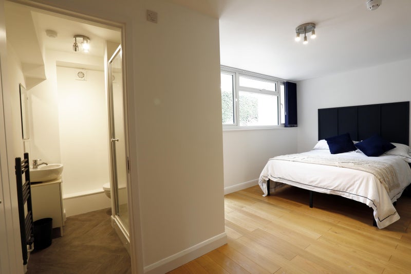Photo 1: Bedroom with ensuite and garden access