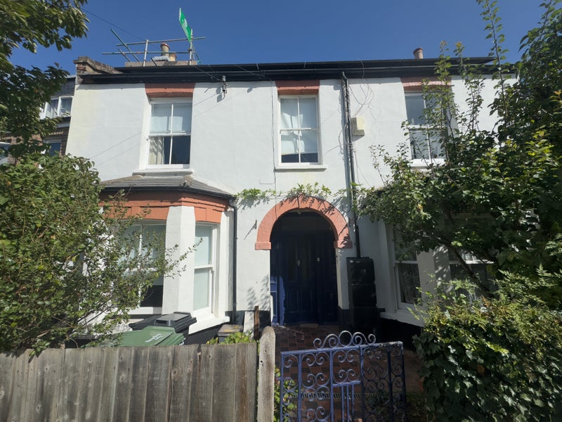 Photo 1: House Front