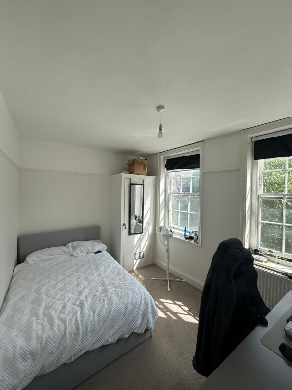 Photo 1: Bedroom (bed and desk available to buy, black out curtains installed)