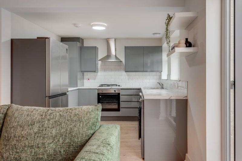 Photo 1: Kitchen/ Living Room
