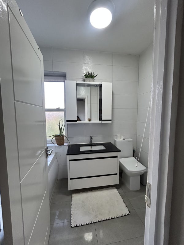 Photo 1: Bathroom with Shawwr / Bath / Toilet and Storage cabinet 