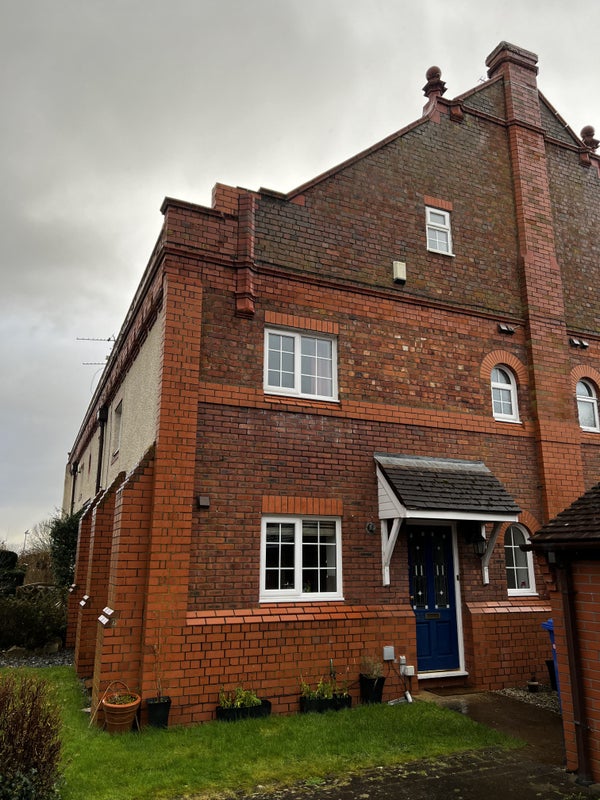 Photo 1: front of house