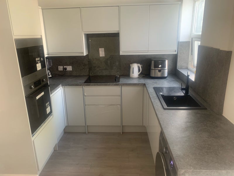 Photo 1: Brand new fitted kitchen 