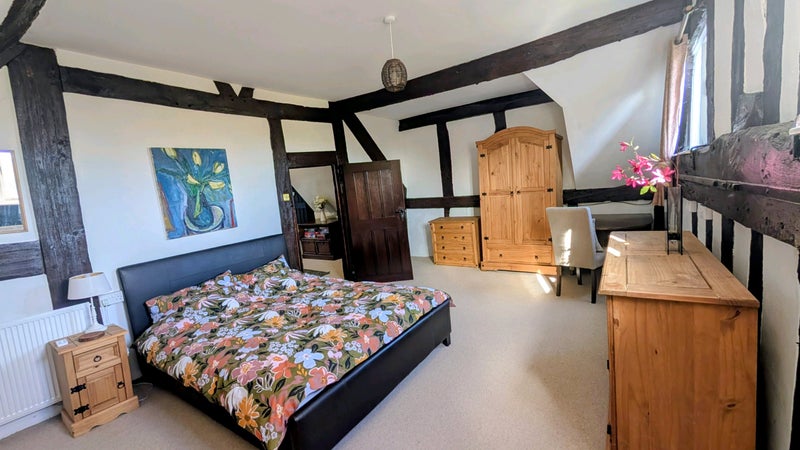 Photo 1: South facing bedroom