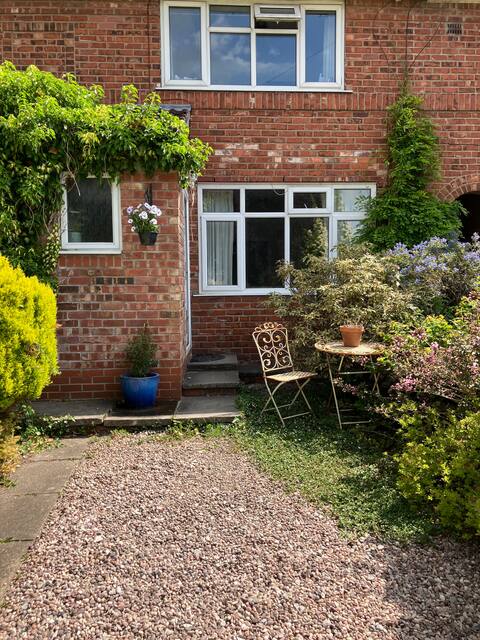 Photo 1: Front of house