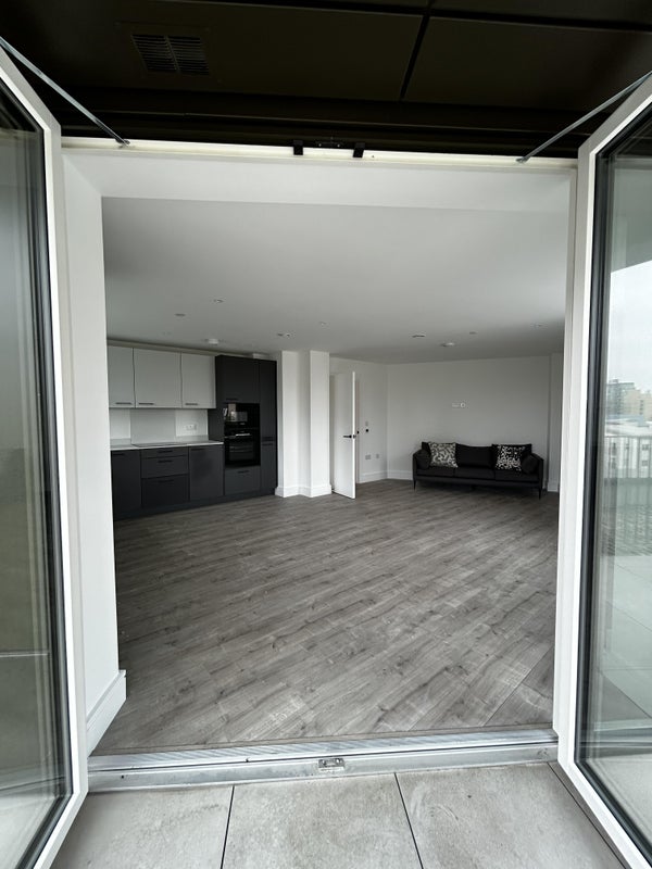 Photo 1: View from Terrace into the Kitchen/Living Room