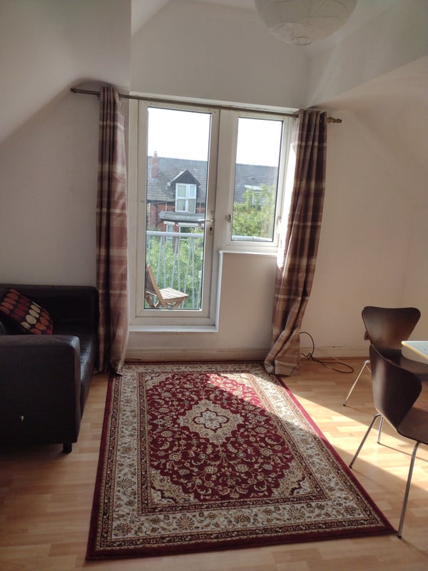 Photo 1: Sitting Room with Balcony